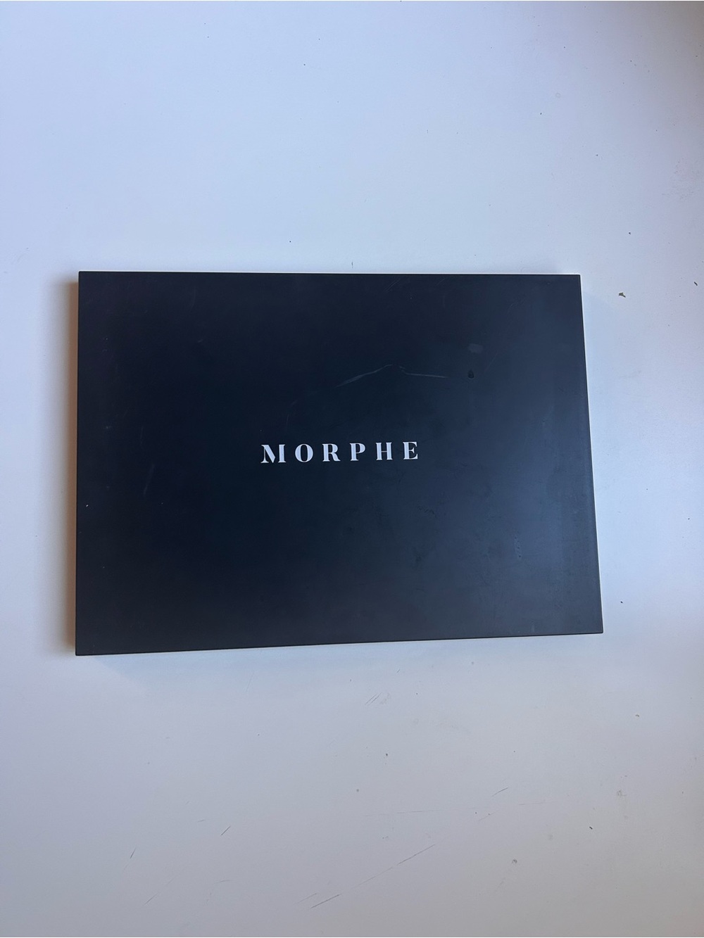 Makeup Palette on White Surface